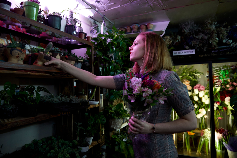 Between gigs, Donna picks up some flowers for a friend.